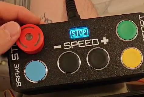 The current remote attached with a cable to the main motor